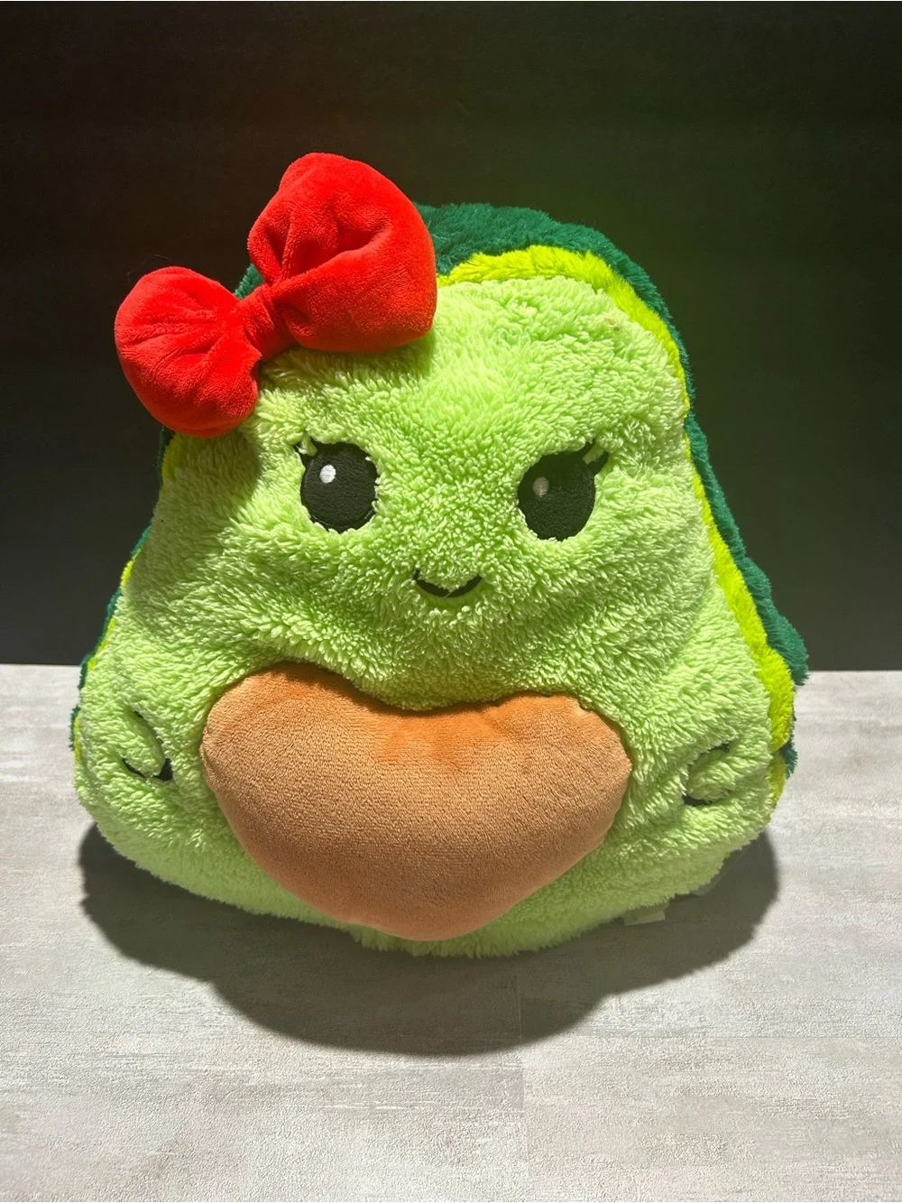 Plush Avocado Pillow with Red Bow